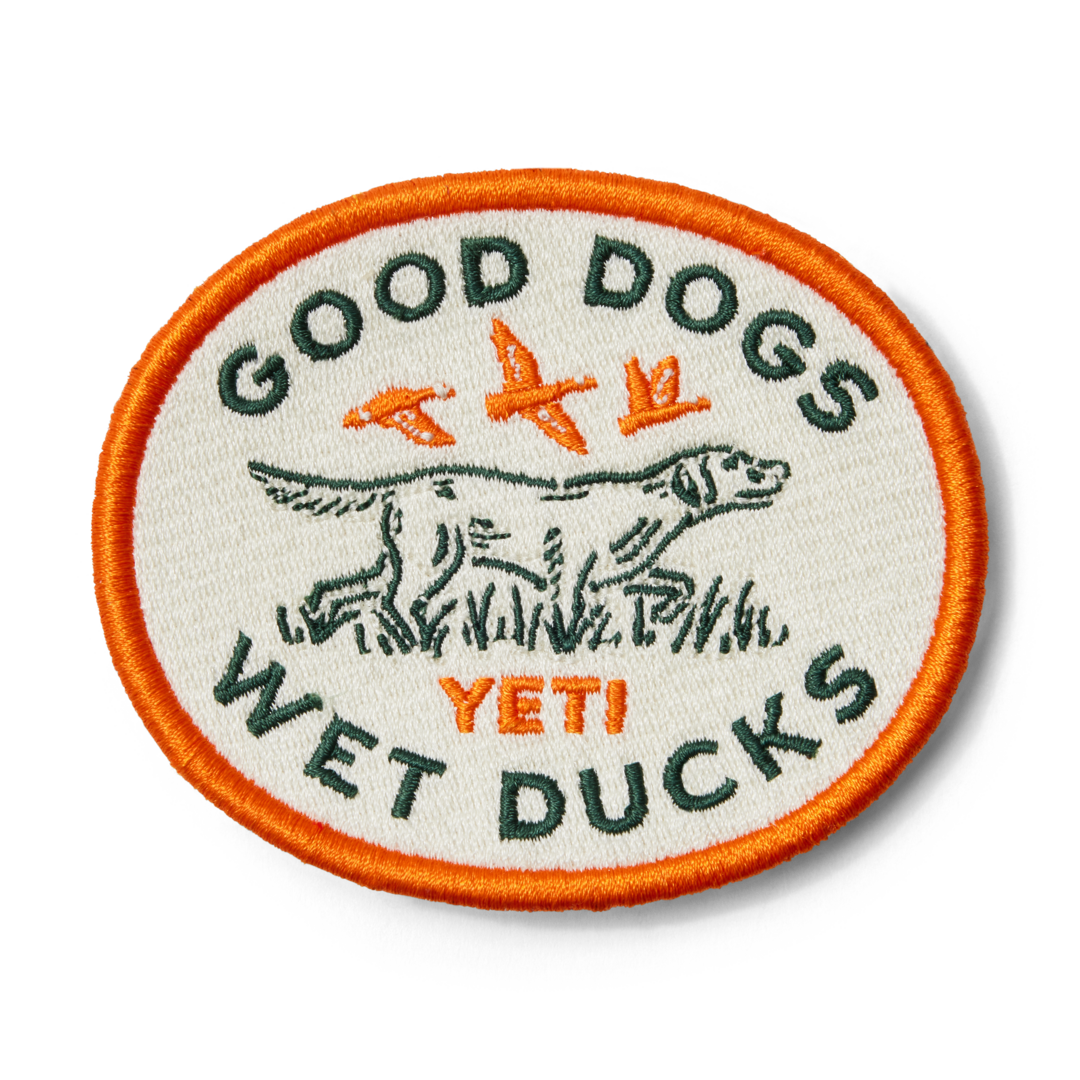 21023007833 PARCHE GOOD DOGS NARANJA MARCA YETI
